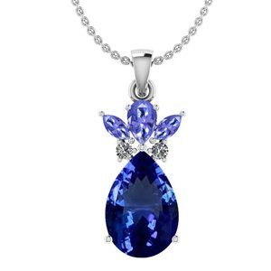 Certified 3.31 Ctw VS/SI1 Tanzanite, Garnet And Diamond pendant in a white gold